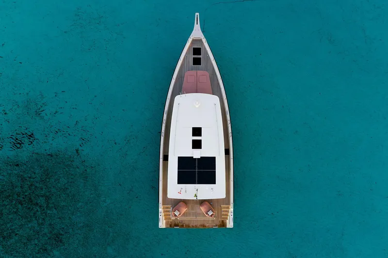  Yacht Photos Pics Aerial view of 2026 Omikron Yachts OT-60 on turquoise water.