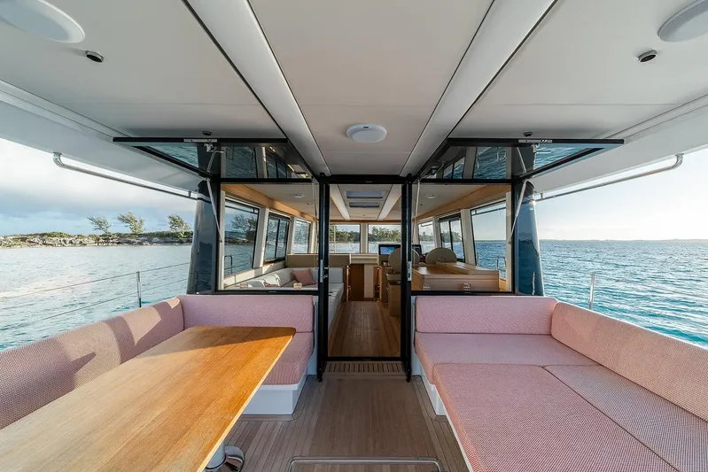  Yacht Photos Pics Luxurious interior of 2026 Omikron Yachts OT-60, featuring spacious seating and ocean views.