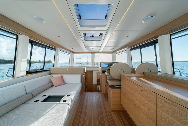  Yacht Photos Pics Luxurious interior of 2026 Omikron Yachts OT-60, featuring modern design and panoramic windows.