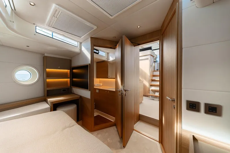 Yacht Photos Pics Luxurious interior of 2026 Omikron Yachts OT-60, featuring modern design and elegant wood finishes.