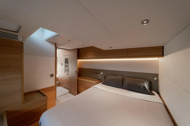  Yacht Photos Pics Luxurious cabin interior of 2026 Omikron Yachts OT-60 with modern design and ambient lighting.