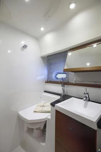  Yacht Photos Pics Luxurious bathroom in 2012 Prestige 440 S yacht with modern fixtures and sleek design.