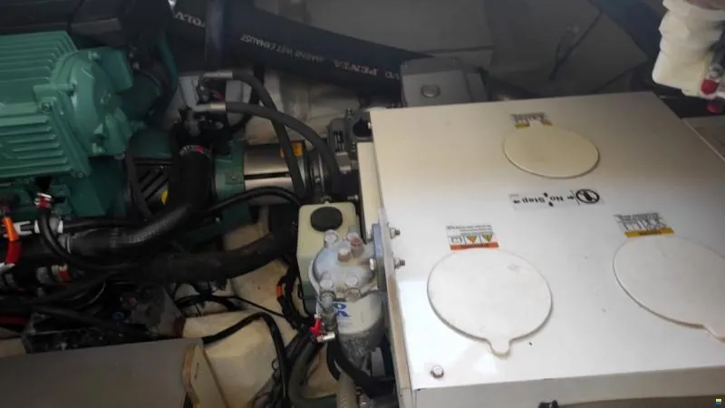  Yacht Photos Pics Engine room of a 2012 Prestige 440 S yacht, showcasing mechanical components and systems.