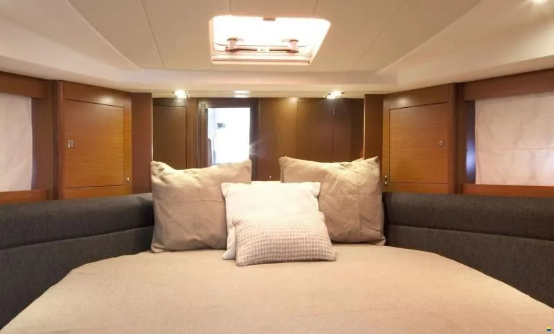  Yacht Photos Pics Luxurious cabin interior of 2012 Prestige 440 S yacht with cozy bedding.