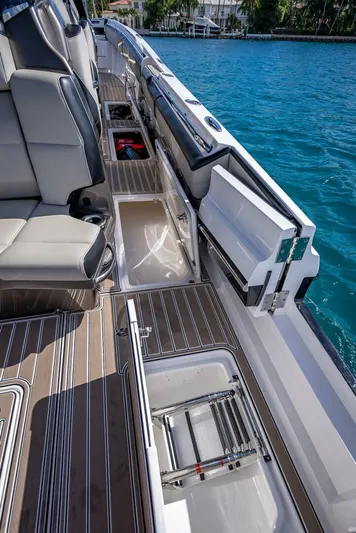  Yacht Photos Pics 2023 Nor-Tech 500 Sport boat interior with luxurious seating and sleek design.