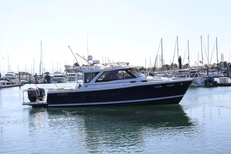 Silver Eagle Yacht Photos Pics 2024 Cutwater 32 Coupe NW Edition yacht docked in marina.