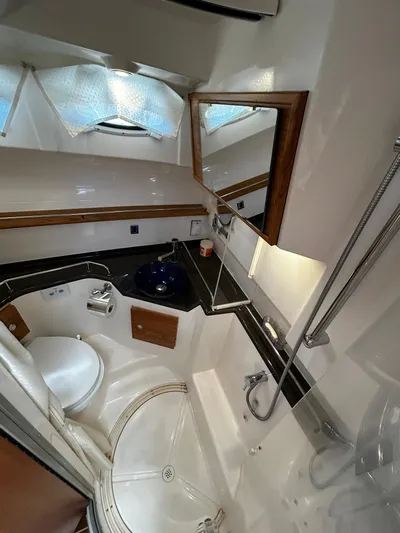 Silver Eagle Yacht Photos Pics 2024 Cutwater 32 Coupe NW Edition bathroom with modern fixtures and sleek design.