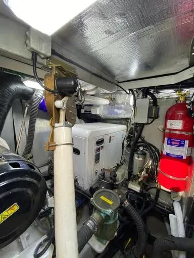 Venko Yacht Photos Pics Engine room of a 2006 Sunseeker Manhattan 50 yacht with various mechanical components.