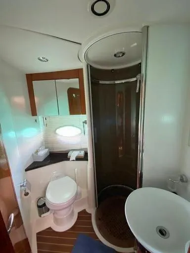 Venko Yacht Photos Pics Bathroom interior of a 2006 Sunseeker Manhattan 50 yacht with modern fixtures.