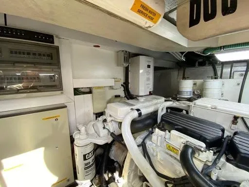 Venko Yacht Photos Pics Engine room of a 2006 Sunseeker Manhattan 50 yacht with visible machinery.