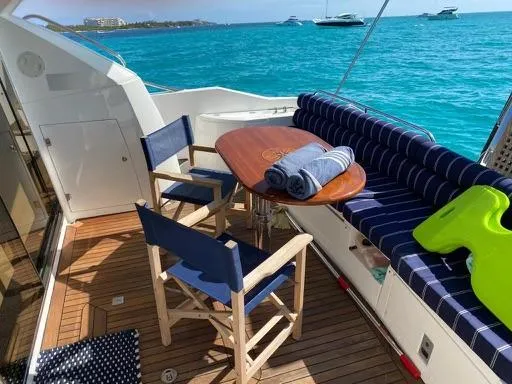 Venko Yacht Photos Pics Sunseeker Manhattan 50 yacht deck with seating, table, and ocean view, 2006 model.