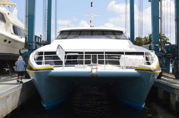 Billie J Yacht Photos Pics High-speed passenger catamaran in dry dock, Custom model, 2008, front view.