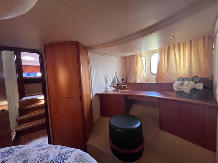  Yacht Photos Pics Luxurious interior of a 2004 Azimut 55 yacht with elegant wood finishes.