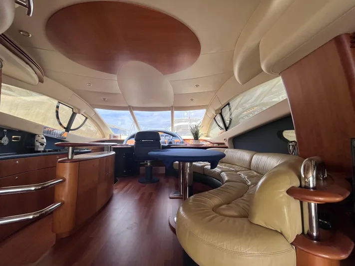  Yacht Photos Pics Luxurious interior of a 2004 Azimut 55 yacht with elegant seating and modern design.