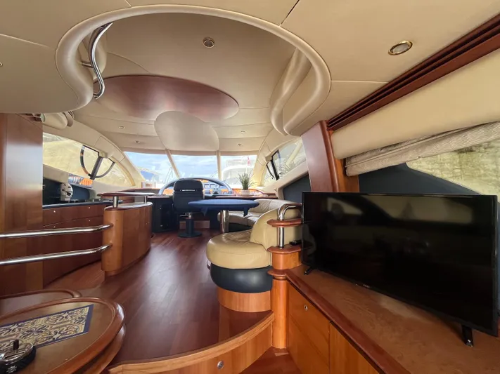  Yacht Photos Pics Luxurious interior of a 2004 Azimut 55 yacht with elegant wood finishes.