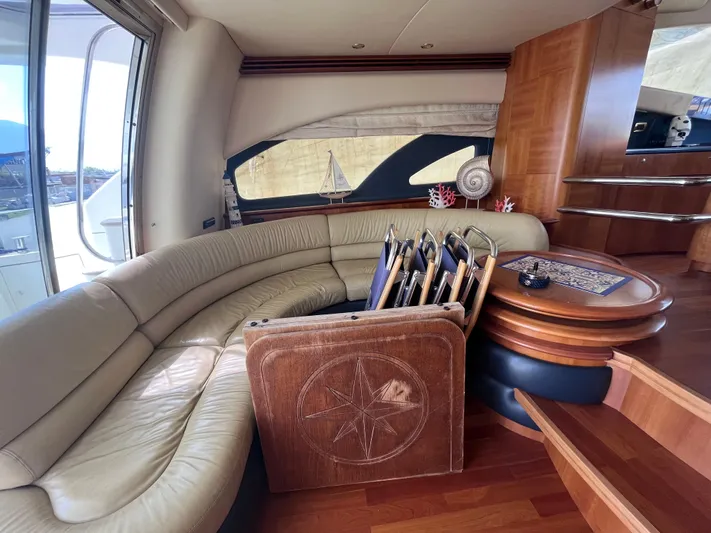  Yacht Photos Pics Luxurious interior of a 2004 Azimut 55 yacht with leather seating and wooden accents.