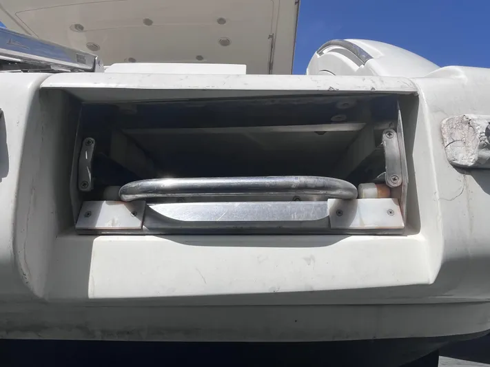  Yacht Photos Pics Close-up of a 2004 Azimut 55 yacht's metal handle and compartment.