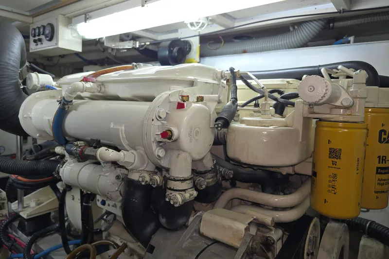 Halcyon Yacht Photos Pics Engine room of 2005 Grand Banks 46 Europa yacht, showcasing mechanical components.