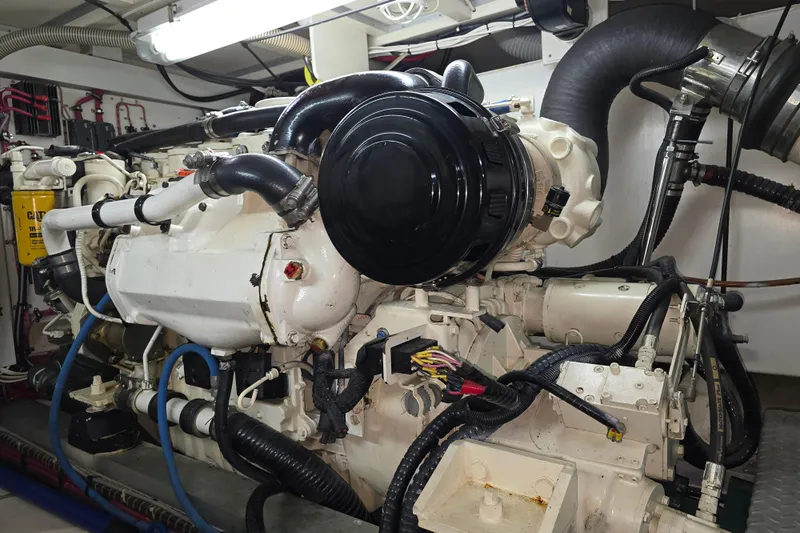 Halcyon Yacht Photos Pics Engine room of 2005 Grand Banks 46 Europa yacht, showcasing complex machinery and components.