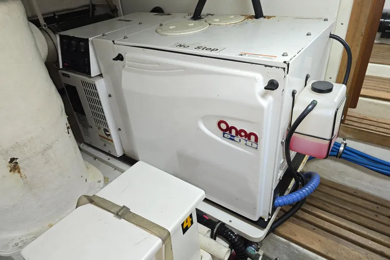Halcyon Yacht Photos Pics Onan generator in a 2005 Grand Banks 46 Europa yacht engine room.
