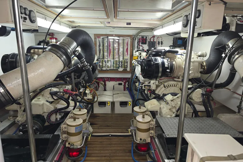 Halcyon Yacht Photos Pics Engine room of 2005 Grand Banks 46 Europa yacht, showcasing complex machinery and systems.