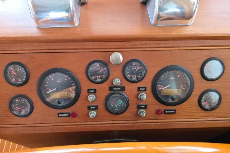 Halcyon Yacht Photos Pics Control panel of a 2005 Grand Banks 46 Europa yacht with gauges and switches.