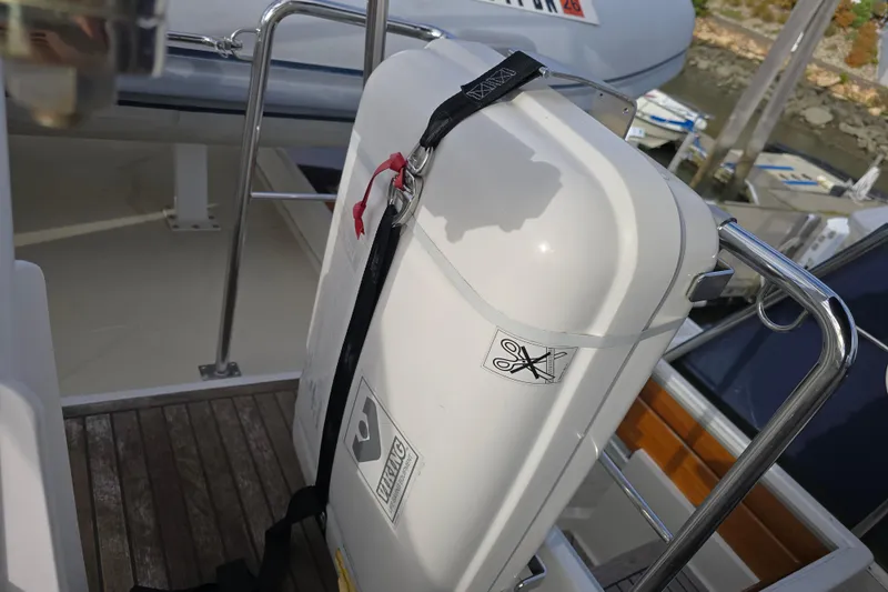 Halcyon Yacht Photos Pics Safety equipment on 2005 Grand Banks 46 Europa yacht deck, featuring a secured Viking container.
