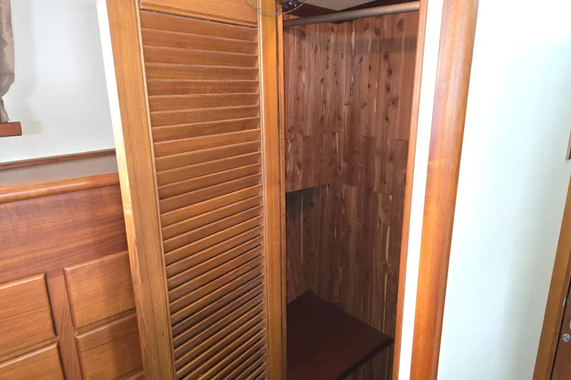 Halcyon Yacht Photos Pics Wooden interior closet on 2005 Grand Banks 46 Europa yacht.
