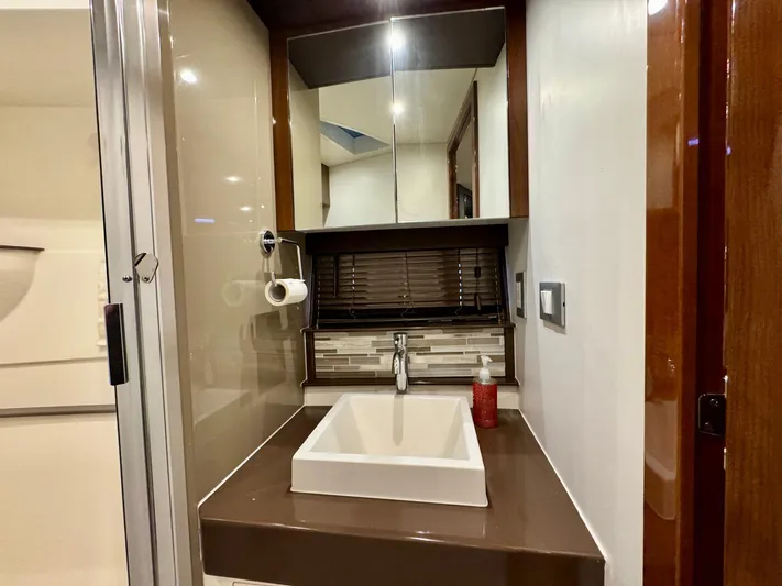  Yacht Photos Pics Modern bathroom sink area in a 2016 Carver C40 Command Bridge yacht.