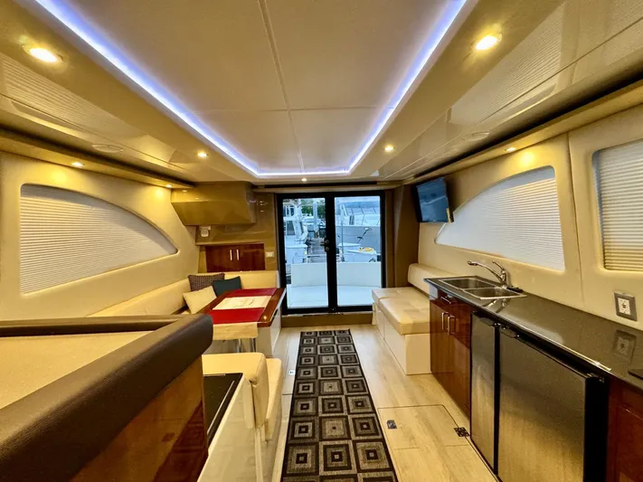  Yacht Photos Pics Luxurious interior of a 2016 Carver C40 Command Bridge yacht with modern amenities.