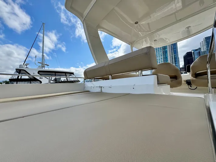  Yacht Photos Pics 2016 Carver C40 Command Bridge yacht interior with city skyline and blue sky.