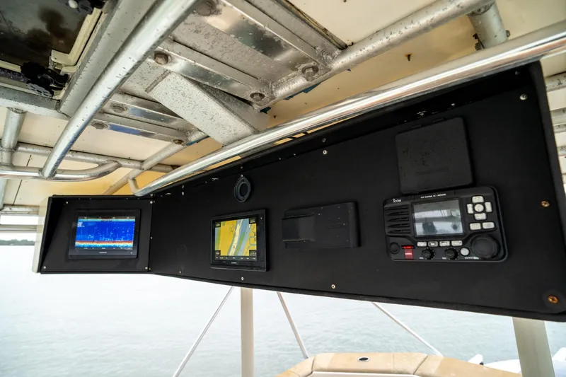  Yacht Photos Pics Control panel of a 1984 Hatteras 52 Convertible boat with navigation equipment.