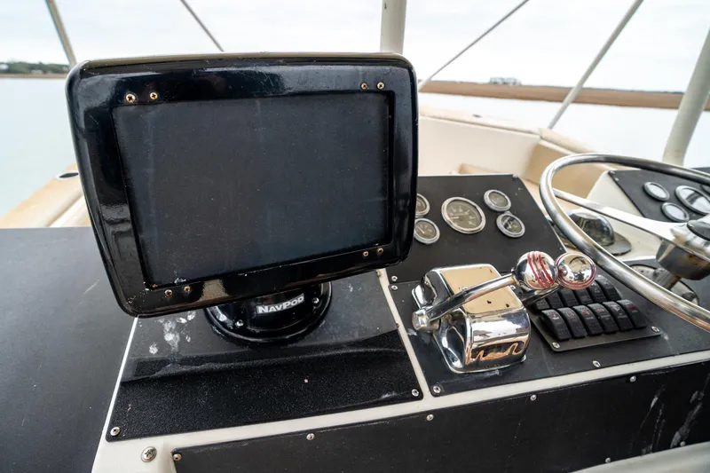  Yacht Photos Pics Control panel of a 1984 Hatteras 52 Convertible boat with navigation equipment.