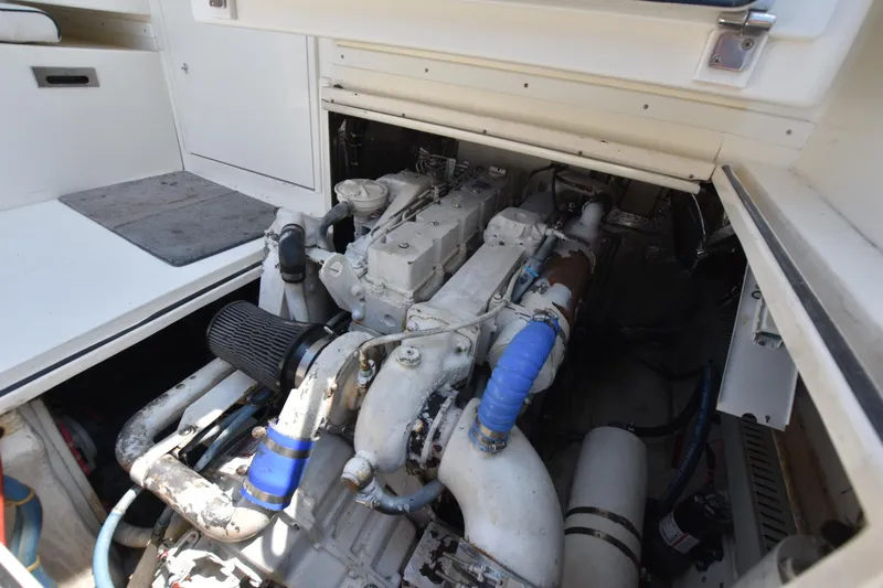  Yacht Photos Pics 1994 Cabo 35 Flybridge Sportfisher engine compartment with visible engine components.