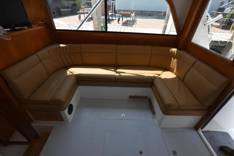  Yacht Photos Pics 1994 Cabo 35 Flybridge Sportfisher interior with tan leather seating.