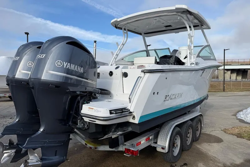  Yacht Photos Pics 2019 Blackfin 272 DC boat with dual Yamaha 250 engines on a trailer.