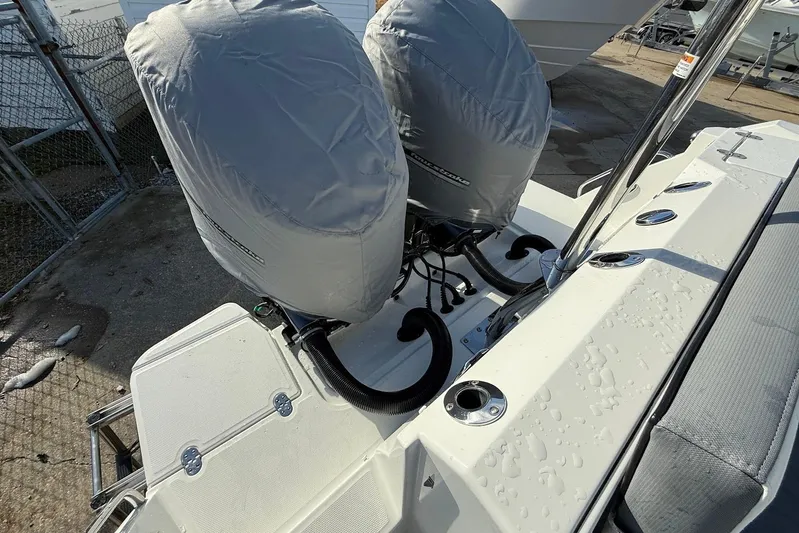  Yacht Photos Pics 2019 Blackfin 272 DC boat with covered dual outboard motors.
