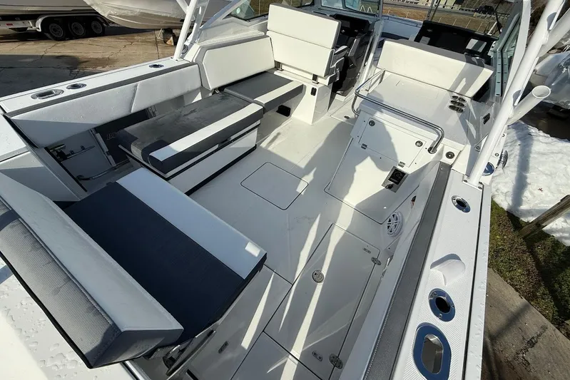  Yacht Photos Pics 2019 Blackfin 272 DC boat interior with white seating and modern design.