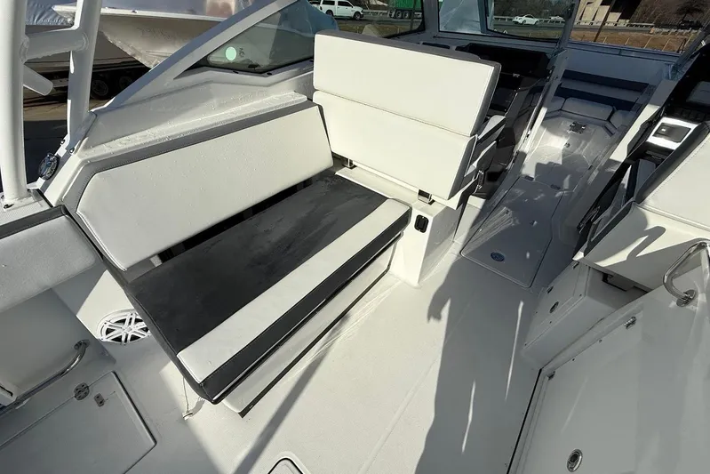  Yacht Photos Pics 2019 Blackfin 272 DC boat interior with white seating and sleek design.