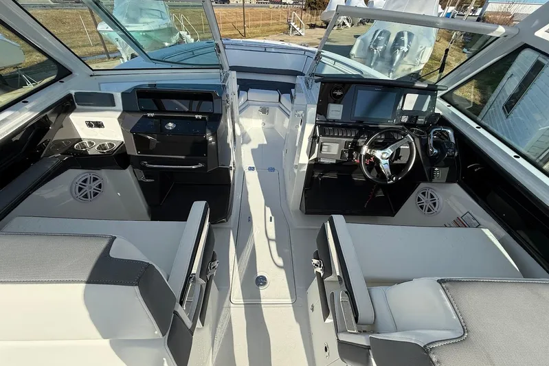  Yacht Photos Pics 2019 Blackfin 272 DC boat interior with modern dashboard and seating.