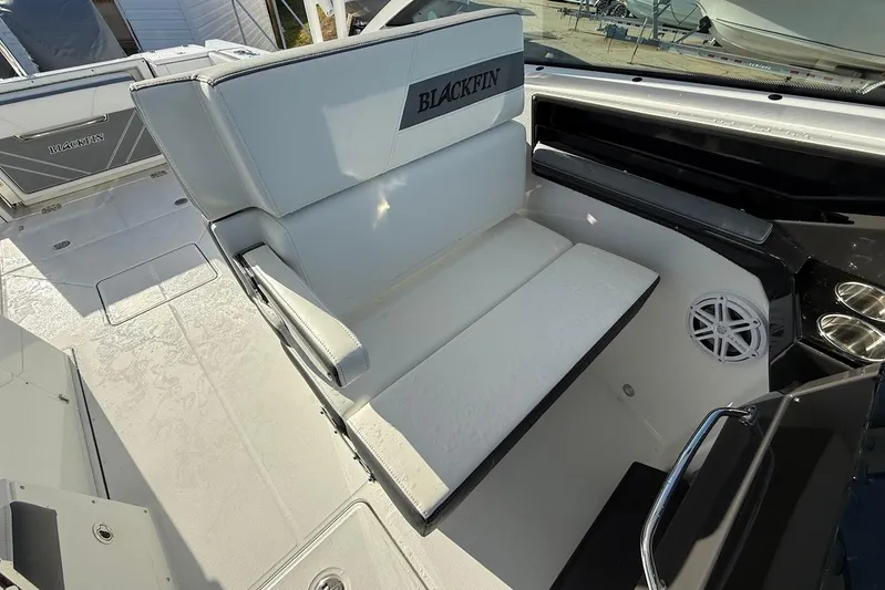  Yacht Photos Pics 2019 Blackfin 272 DC boat interior with white seating and speaker.