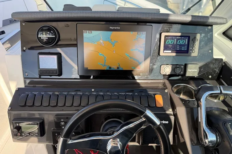  Yacht Photos Pics 2019 Blackfin 272 DC boat dashboard with navigation and control systems.