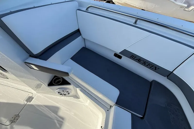  Yacht Photos Pics 2019 Blackfin 272 DC boat interior seating with sleek design and speaker system.