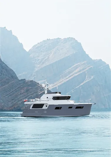  Yacht Photos Pics 2026 Cormorant Yachts COR55 RAV PURE NAVIGATOR cruising near scenic mountains.