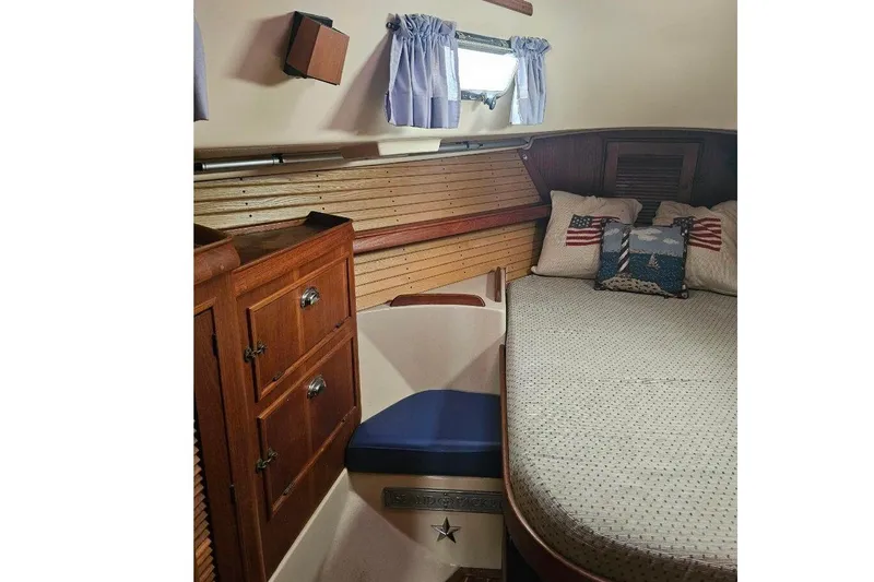 Water Dance Yacht Photos Pics Cozy cabin interior of 1999 Island Packet 350 sailboat with nautical decor.