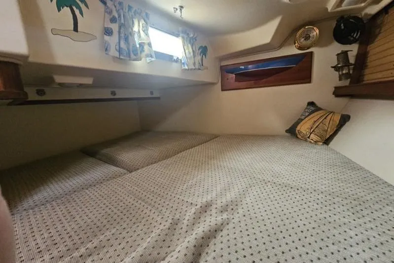 Water Dance Yacht Photos Pics Cozy cabin interior of a 1999 Island Packet 350 sailboat with nautical decor.