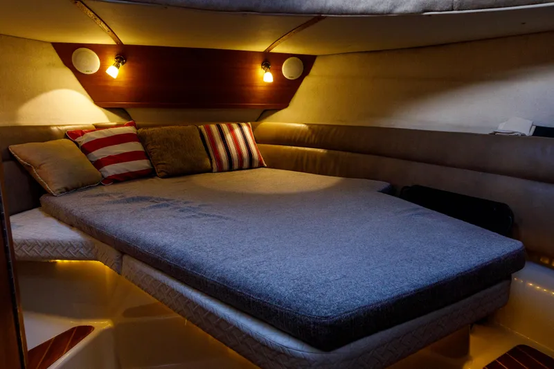  Yacht Photos Pics Cozy cabin interior of 2010 Ranger Tugs R-29 Sedan Luxury Edition with ambient lighting.