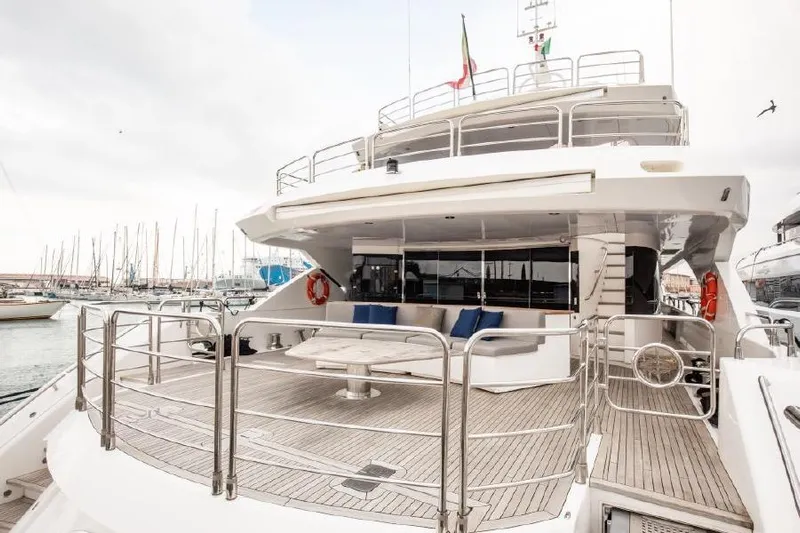  Yacht Photos Pics Luxurious 2014 Sunseeker 40 Metre Yacht with spacious deck and elegant seating area.