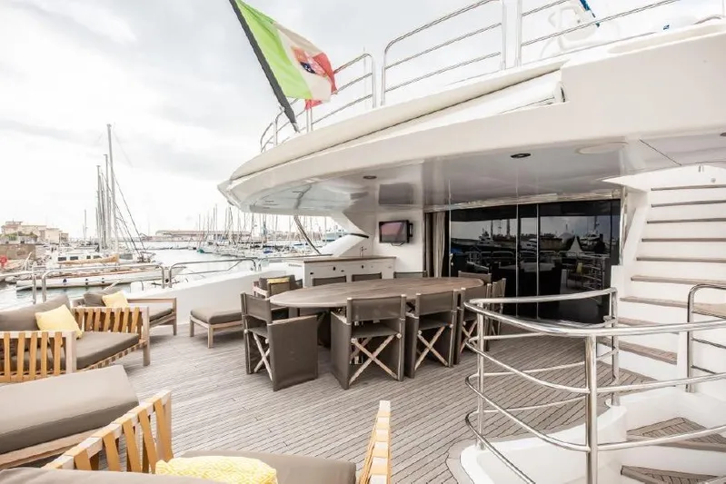  Yacht Photos Pics Luxurious Sunseeker 40 Metre Yacht 2014 with spacious deck, dining area, and marina view.