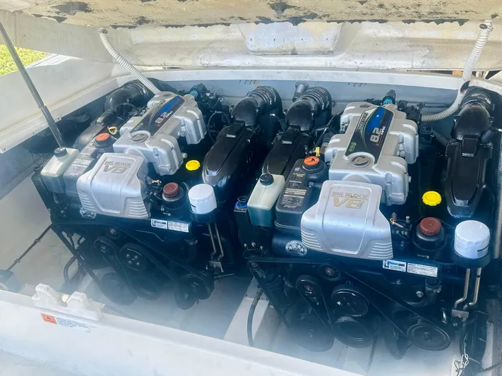  Yacht Photos Pics Twin engines in a 2015 Chris-Craft Launch 32 boat, showcasing powerful V8 configuration.